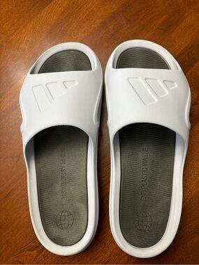Adidas Adilette Lumia White Slides with Gray Footbeds.